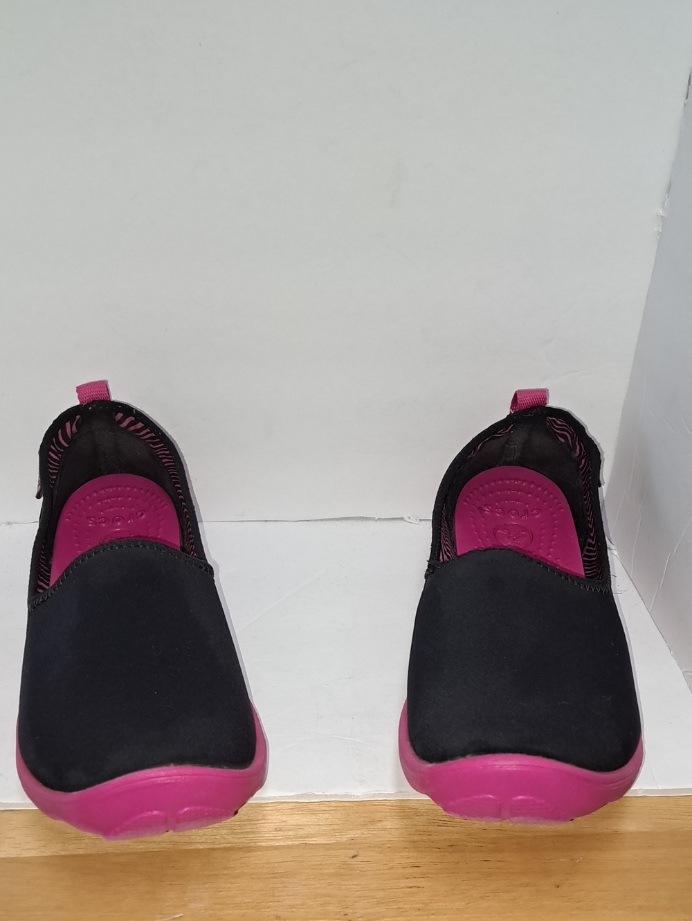 CROCS Women's Black Slip-On Sneakers with Pink Accents